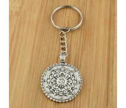 Porte-clés fleur de vie feuille de lotus symbole Om argenté