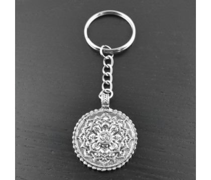 Porte-clés fleur de vie feuille de lotus symbole Om argenté