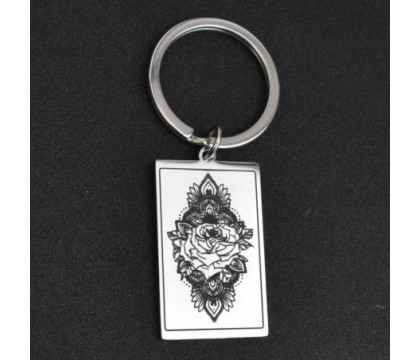 Porte-clés fleur de lotus dans un rectangle acier inoxydable Porte-clés fleur de lotus dans un rectangle acier inoxydable