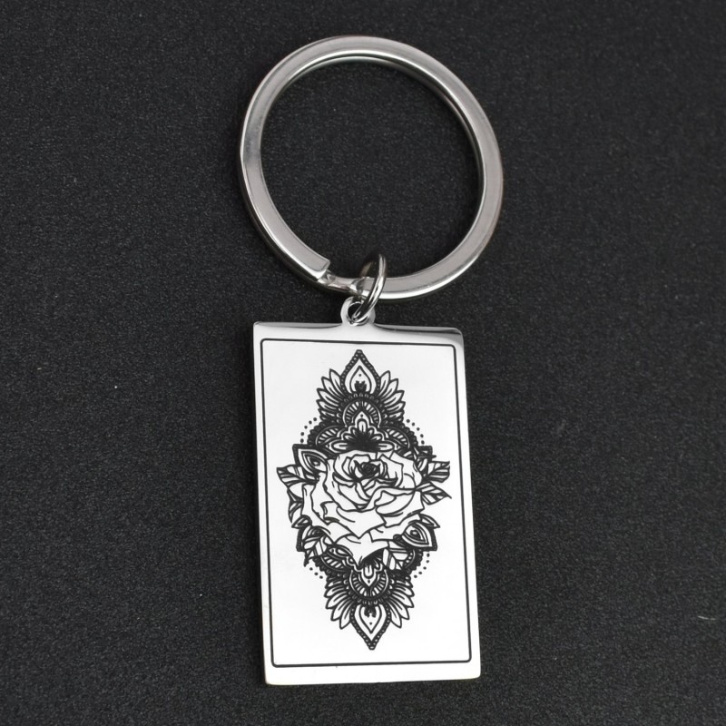 Porte-clés fleur de lotus dans un rectangle acier inoxydable Porte-clés fleur de lotus dans un rectangle acier inoxydable