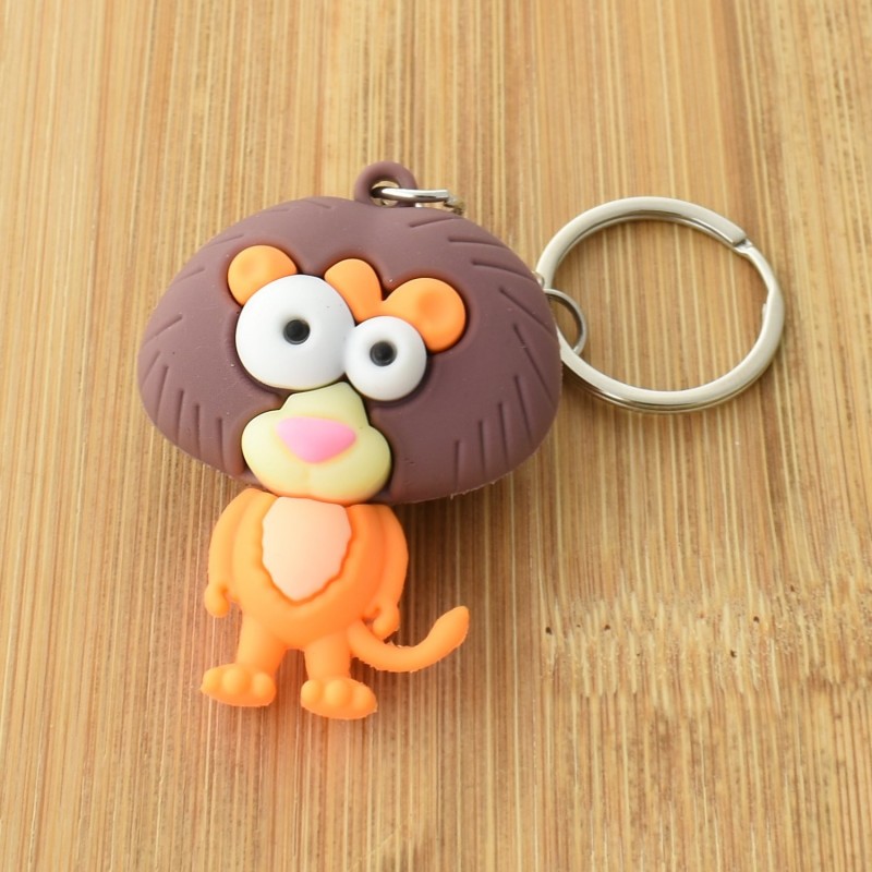 Porte-clés lion rigolo orange et marron en 3D