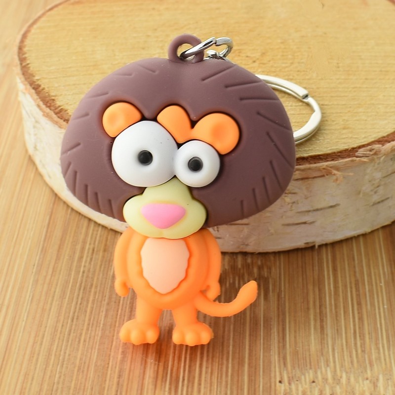 Porte-clés lion rigolo orange et marron en 3D