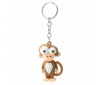 Porte-clés singe rigolo marron et blanc en 3D