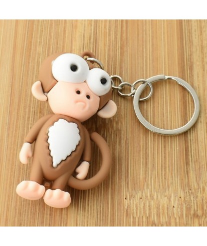 Porte-clés singe rigolo marron et blanc en 3D
