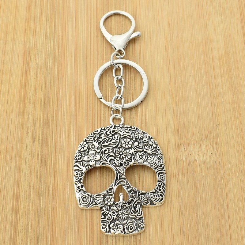 Porte-clés tête de mort cavalera crâne fleuri bijou de sac avec mousqueton et anneau argenté