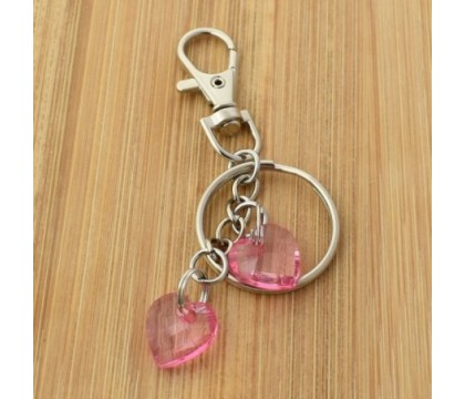 Porte-clés bijou de sac argenté 2 coeurs roses à facettes