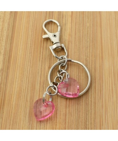 Porte-clés bijou de sac argenté 2 coeurs roses à facettes