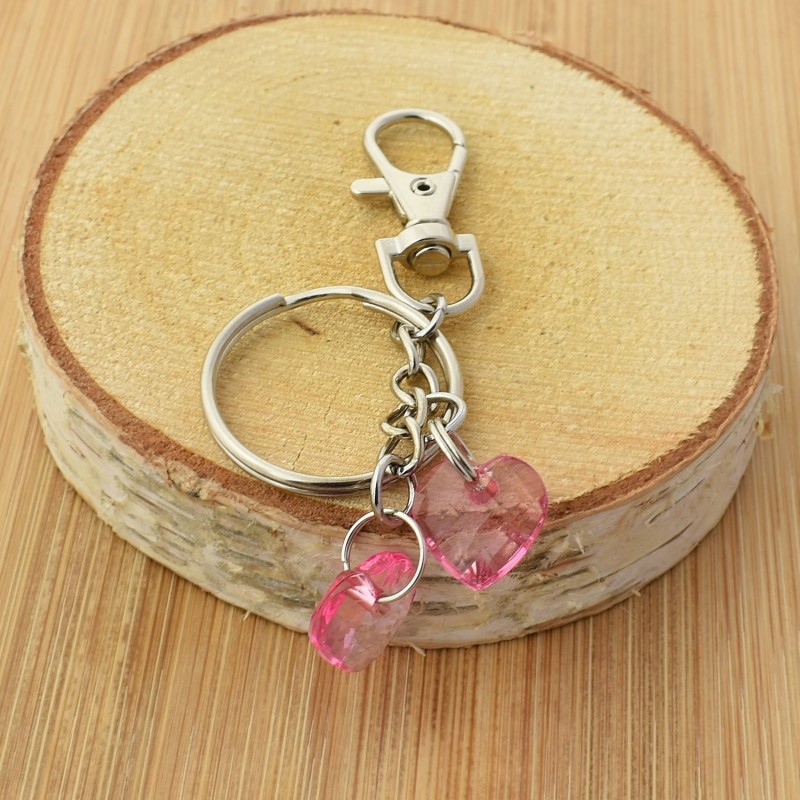Porte-clés bijou de sac argenté 2 coeurs roses à facettes