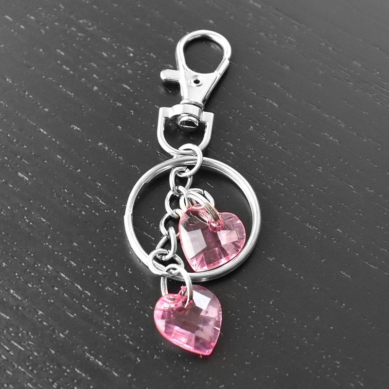 Porte-clés bijou de sac argenté 2 coeurs roses à facettes