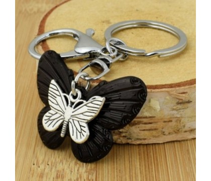 Porte-clés 2 papillons bijou de sac avec mousqueton et anneau argenté Porte-clés 2 papillons bijou de sac avec mousqueton et anneau argenté