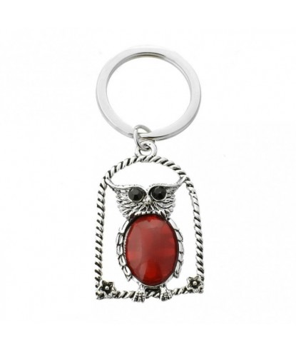 Porte-clés hibou rouge sur son perchoir avec fleurs yeux strass argenté
