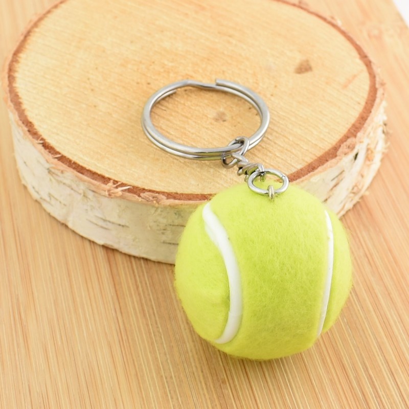 Porte-clés balle de tennis couleur vert et blanc argenté Porte-clés balle de tennis couleur vert et blanc argenté