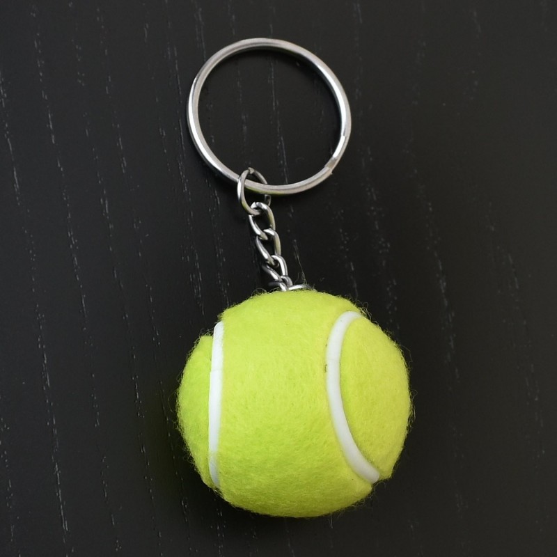 Porte-clés balle de tennis couleur vert et blanc argenté Porte-clés balle de tennis couleur vert et blanc argenté