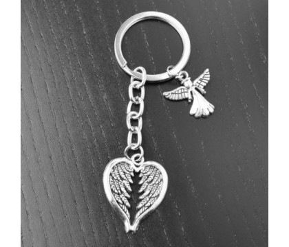 Porte-clés ange et ailes en forme de coeur argenté Porte-clés ange et ailes en forme de coeur argenté