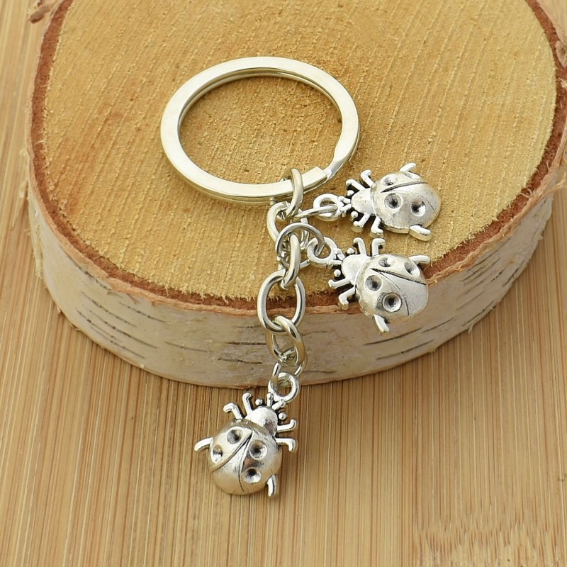 Porte-clés coccinelle 3 pendentifs porte-bonheur argenté