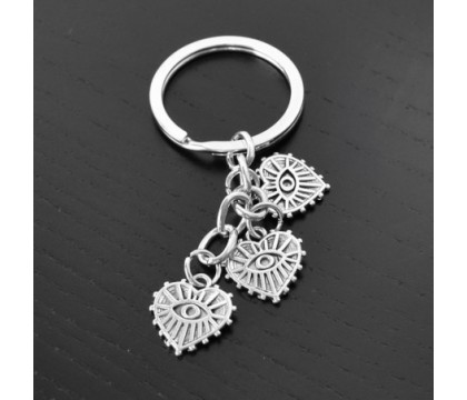 Porte-clés 3 pendentifs oeil dans un coeur argenté