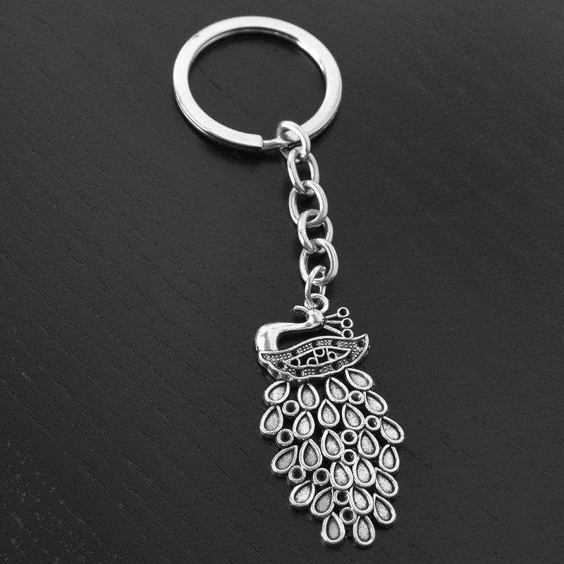 Porte-clés Paon majestueux argenté