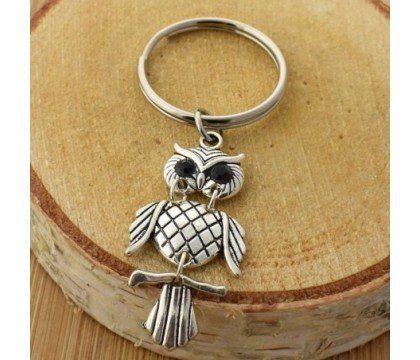Porte-clés hibou yeux noirs articulé argenté