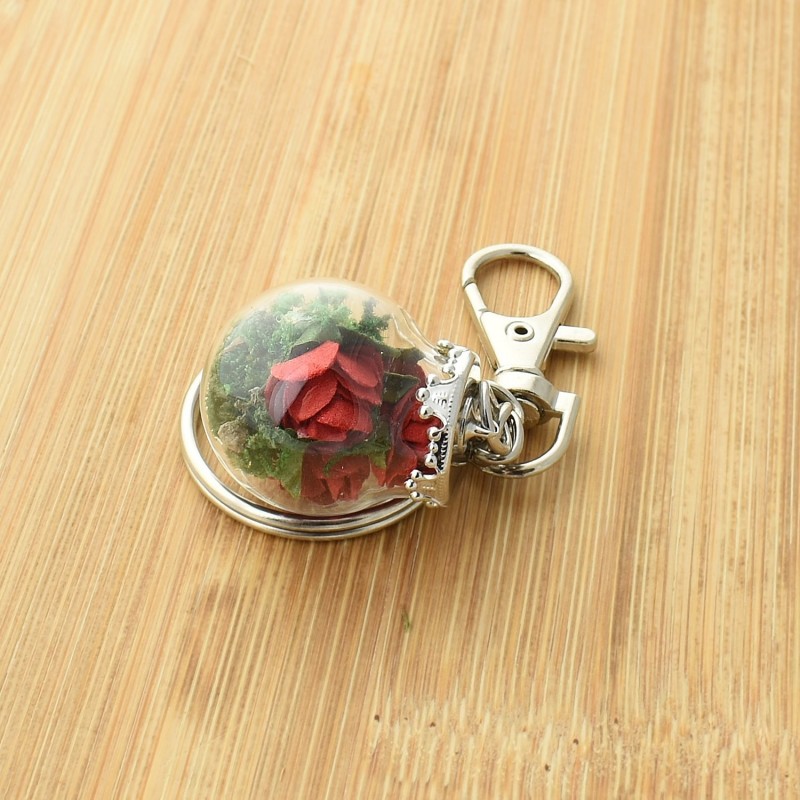 Porte-clés bijou de sac petit flacon de roses rouges