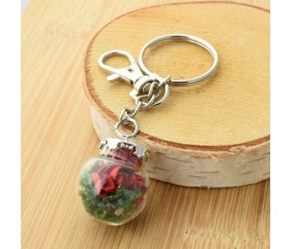 Porte-clés bijou de sac petit flacon de roses rouges