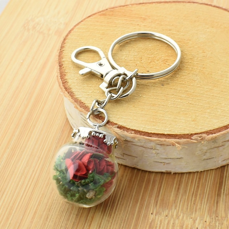 Porte-clés bijou de sac petit flacon de roses rouges