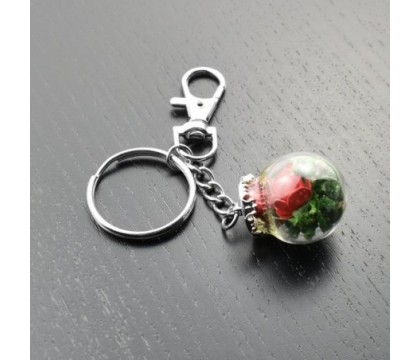 Porte-clés bijou de sac petit flacon de roses rouges