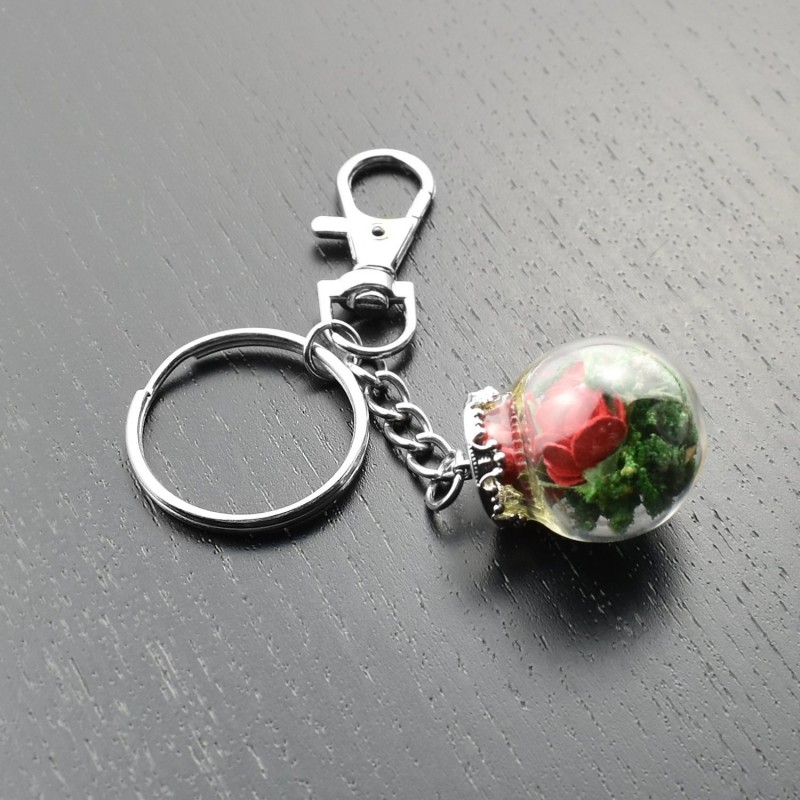 Porte-clés bijou de sac petit flacon de roses rouges
