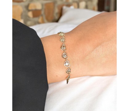 Bracelet suite de coeurs Plaqué OR 750 3 microns