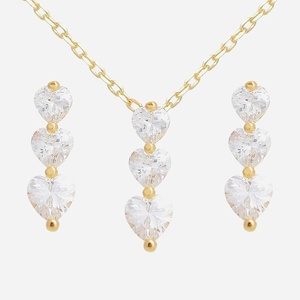 Parure trois coeurs plaqué or zirconium